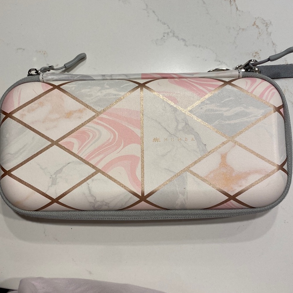 Nintendo switch case pink and white